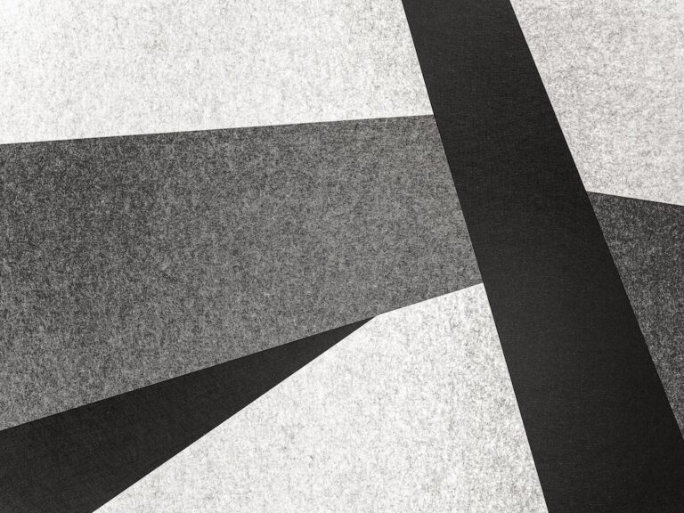 white and black striped textile